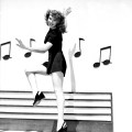 1944: Rita Hayworth (1918 – 1987) dances along an outsize piano keyboard, surrounded by musical notes, in the film &lsquo;Cover Girl&rsquo;, directed by Charles Vidor. (Photo by Ned Scott)